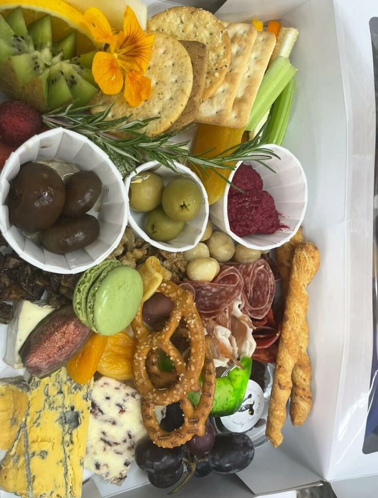 Charcuterie & Cheese Platter for Two A delightful sharing board featuring a selection of local artisan cheeses and fine salamis,